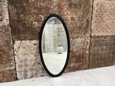 antique bevelled oval mirror